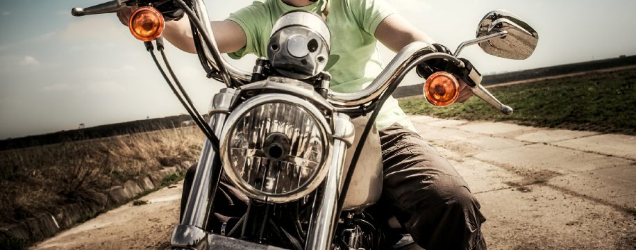 Man riding his newly repaired motorcycle, which was repaired at The Bridge Auto in Philadelphia.